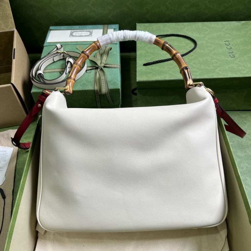 G*u*i top handle bags